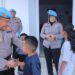 Maknai HUT ke-23, Propam Polres Kotamobagu Berbagi Kebahagiaan Bersama Anak Yatim