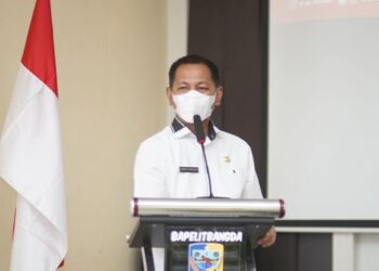 Foto : Sekda Boltara, Dr. Jusnan C. Mokoginta, MARS, saat menyampaikan sambutan terkait rencana perombakan Kabinet SJL - MAP