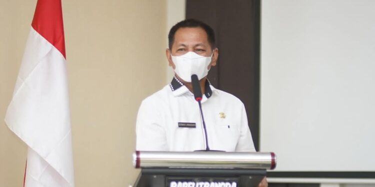 Foto : Sekda Boltara, Dr. Jusnan C. Mokoginta, MARS, saat menyampaikan sambutan terkait rencana perombakan Kabinet SJL - MAP