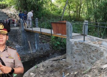 Inovasi Pelayanan Sosial, Polres Kotamobagu Bangun Jembatan MOTABI di Kelurahan Biga