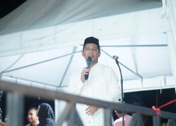 Foto : Sekretaris Daerah Jusnan C. Mokoginta saat membuka Gebyar Pasar Senggol Boroko